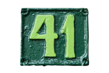 Old retro weathered cast iron plate with number 41 closeup isolated on white background