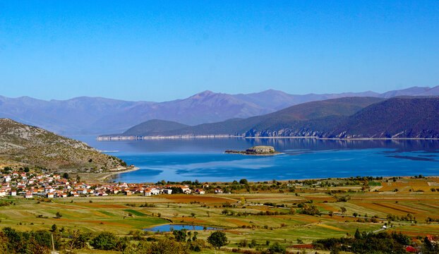 picture of a lake Prespa in Albania and island Maligrad in autumn