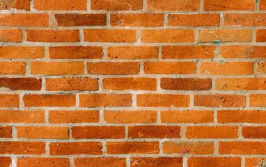 Obraz premium Old red brick wall texture with scratches and strips cement. Grunge background closeup.