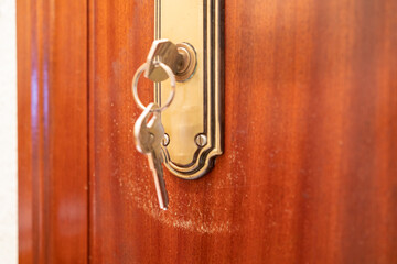 Close up of a door lock scratched by keys