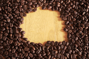 coffee beans on wood table. coffee seed