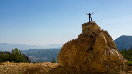 Fototapeta premium mountaineering success, tackling challenges and enjoying victory