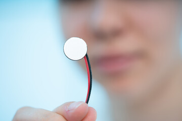 holding a piezoelectric ultrasonic emitter used for cleaning system and ultrasonic location