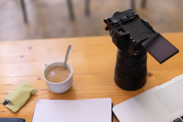 a photographer's desk at a coffee break