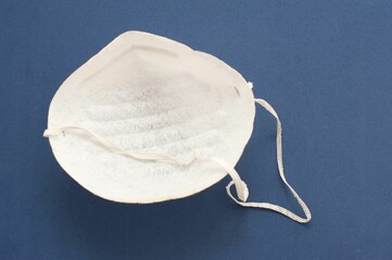 Top view of a protective disposable mask for covering the nose and preventing the inhalation of dust