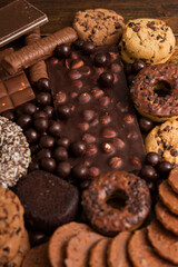 Beautiful chocolate, doughnuts, chocolate stick, and chocolate chip cookies background