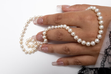 stylish female manicure , beautiful female hands on a white background