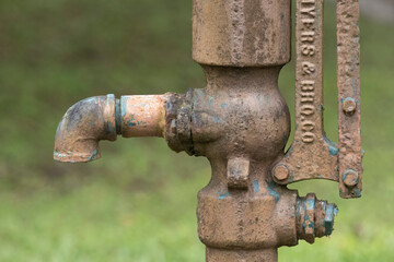 Close up view of an old water pump