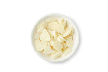 Fototapeta na wymiar Fresh chopped garlic on white bowl isolated on white background. Top view