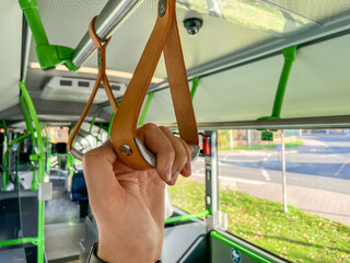 Straps in a modern bus. public transportation