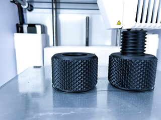 Three dimensional 3d printer working at 3d printing lab.