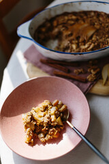 homemade autumn warm apple pear oatmeal bake with cinnamon