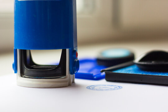 Stamp with print on paper closeup