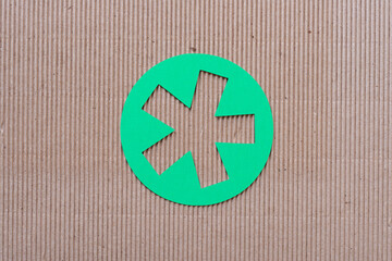 corrugated paper background with asterisk cutout