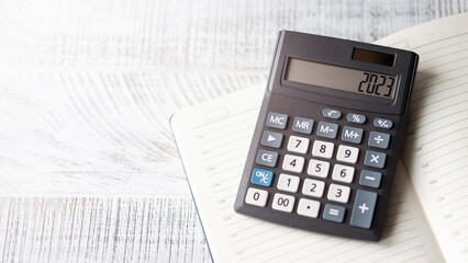 New Year's layout with calculator, Santa's hat and Christmas decorations