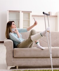 Young woman after car accident suffering at home