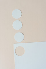 three paper circles and card stock with circle cutout