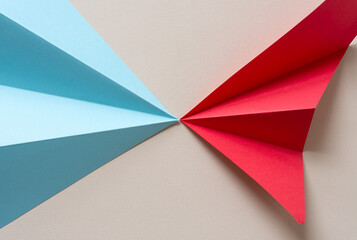 blue and red folded paper triangles