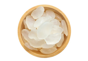 Candy palm seed, Close up of palm seed, palm fruit seeds or Arenga pinnata in wooden bowl isolated on white background with clipping path.