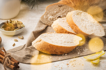 Ingredients for preparing spanish torrijas, french toasts  or traditional Portuguese rabanadas for Christmas. Typical sweet food for Christmas made with slices of bread, eggs, cinnamon, milk and lemon