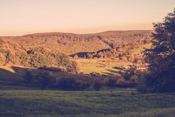 Hilly rural landscape in autumn season.