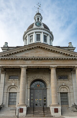 Fototapeta na wymiar Kingston Ontario City Hall Facade with Clock Tower