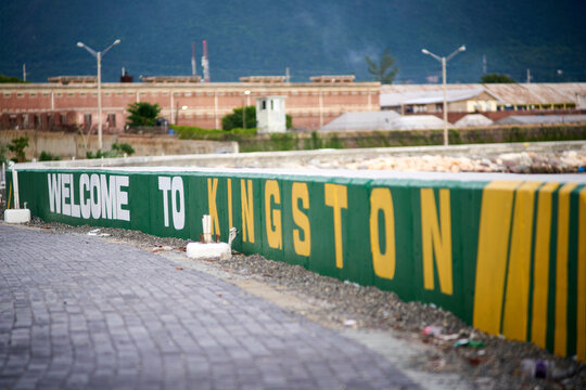 A mural saying "Welcome to Kingston" in Jamaica