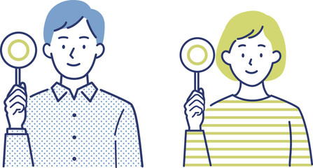 A man and a woman holding a round tag and explaining