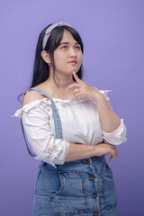 Chubby Asian Woman Isolated on Purple Background