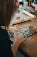 Person Working with Clay