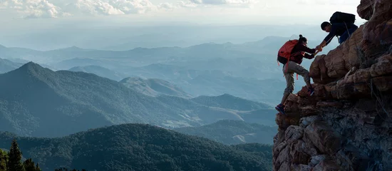 Fotobehang Asia couple hiking help each other on mountains © pakorn