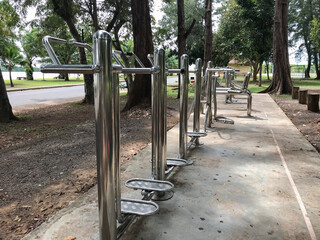 Stainless exercise equipment in the park area, free service for people.