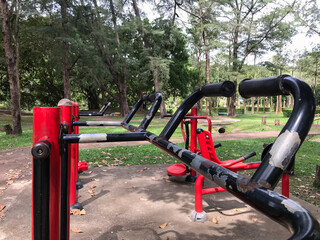 Old exercise equipment in the park area, free service for people.