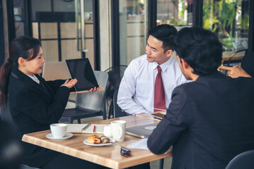 Team Business Partners shaking hands together to Greeting Start up small business in meeting room. Shakehand teamwork partners at modern office handshake together. Business mergers and acquisitions