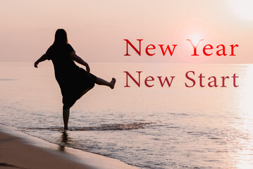 2025 New Year new Start, Healthy woman kick splashing water at sunrise. Relaxation and happy life time.