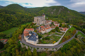 Aerial fly over above Saint-Bertrand-de-Comminges one of the Plus Beaux Villages in the French side...