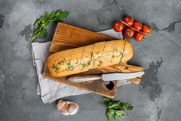 Homemade vegetarian sandwich cream cheese butter garlic bread, on gray stone table background, top...