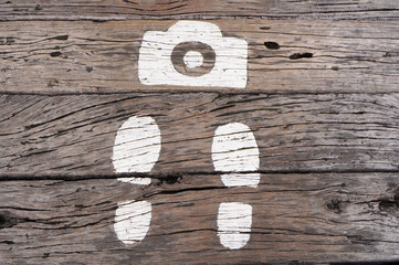 photo spot footprint mark on the floor that suggest the photographer the good spot to take photo
