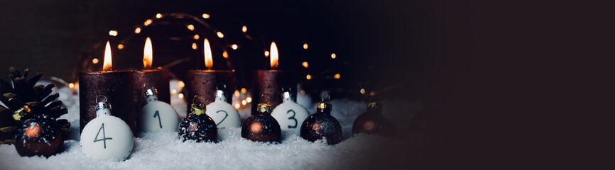 Christmas background, decoration - four brown burning advent candles with number in snow - obrazy, fototapety, plakaty