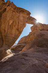 Fototapeta na wymiar Um Frouth Rock Arch in Wadi Rum, a Natural Bridge in Jordan, also called Jabal Umm Fruth