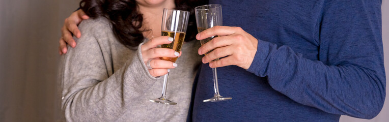 Champagne glasses in people hands. Party or celepration concept. Close up