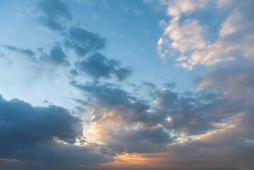Naklejka na ściany i meble Sky cloudy background. Beautiful sunset with clouds.