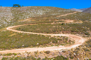 Drone photography from the winding country road to the top of Attavyros Mountain. Rhodes Island,...