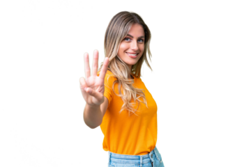 Young Uruguayan woman over isolated background happy and counting three with fingers