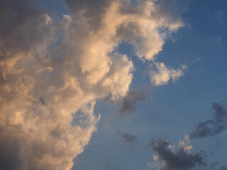 dramatic blue sky at sunset with clouds background