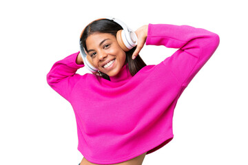 Young African American woman over isolated background listening music