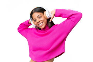 Young African American woman over isolated background listening music