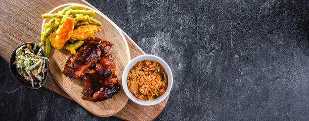 Chicken thighs in tamarind sauce with tom yum wok fried rice