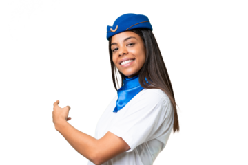 Airplane stewardess African american woman over isolated background pointing back