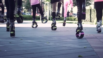 Group fitness classes of girls on the street.